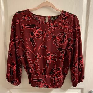 Reddish/Burgundy blouse w/black flower detail